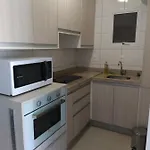 Apart um dormitório com piscina frente mar